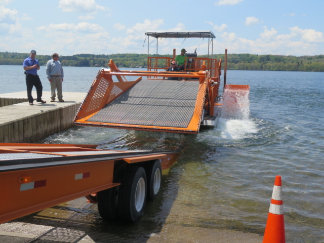 Alphaboats FX-11 Waterweed Harvester being Launched from a Transport Trailer