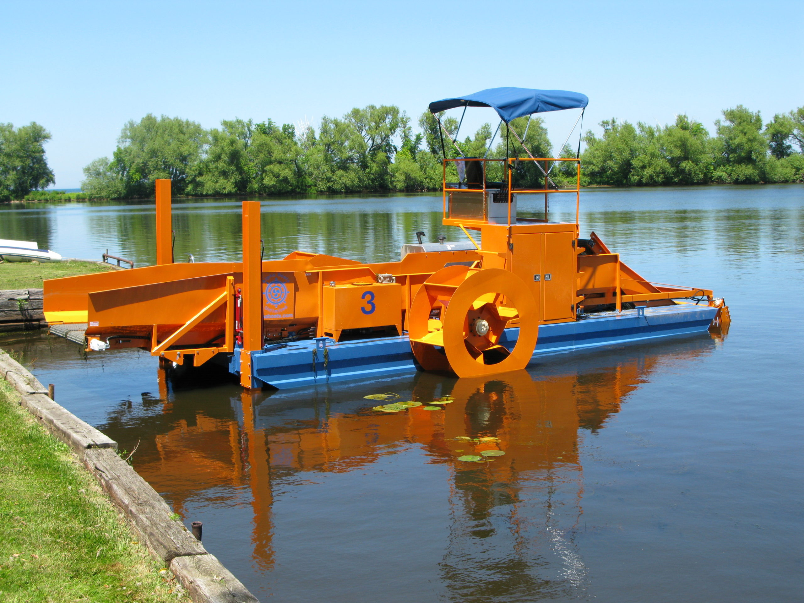 Alphaboats FX7 Waterweed Harvester with Spuds Anchored