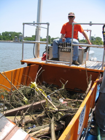 MC 202 with a loaded with debris