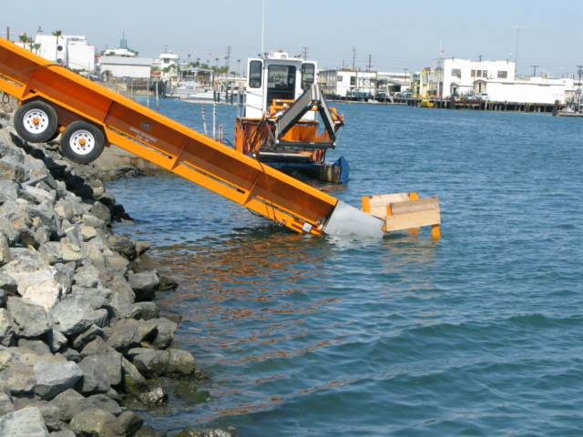 Alphaboats PC6036 Pier Conveyor and Alphaboats Trash Skimmer working at harbor